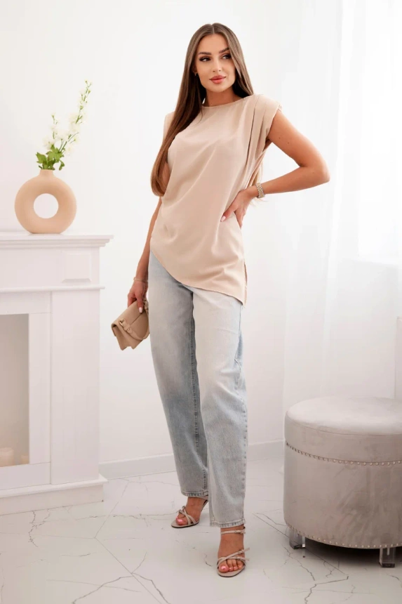 Elegant women's blouse with ruffles and asymmetrical cut beige