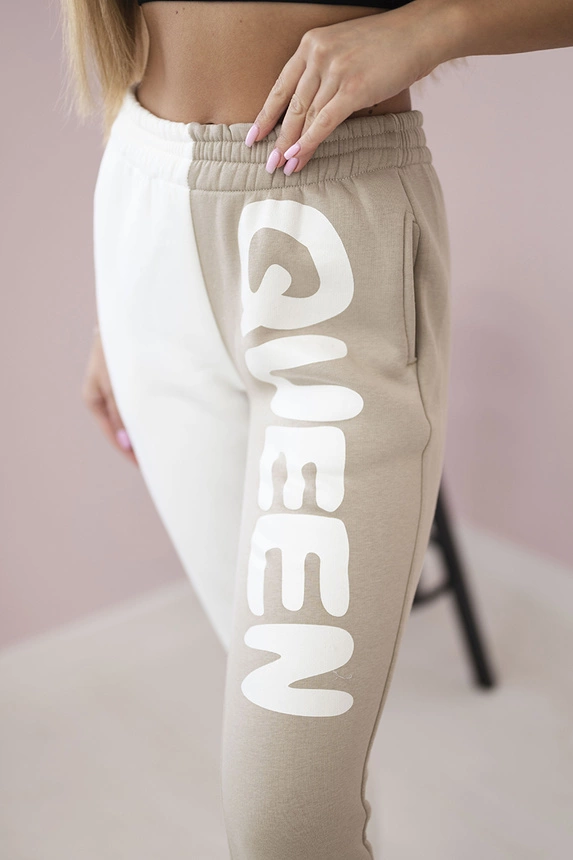 Dámské tepláky s nápisem QUEEN béžový