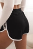 Women's cotton shorts with an elastic waistband and sporty piping black