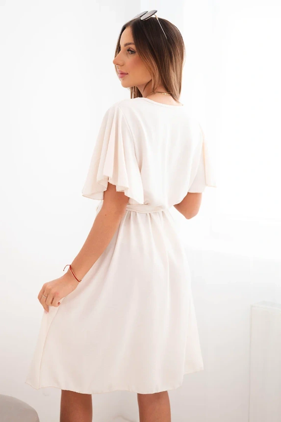 Dress with a crossover neckline light beige