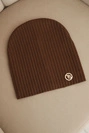 Women's ribbed hat with decorative button made of viscose and modal light brown