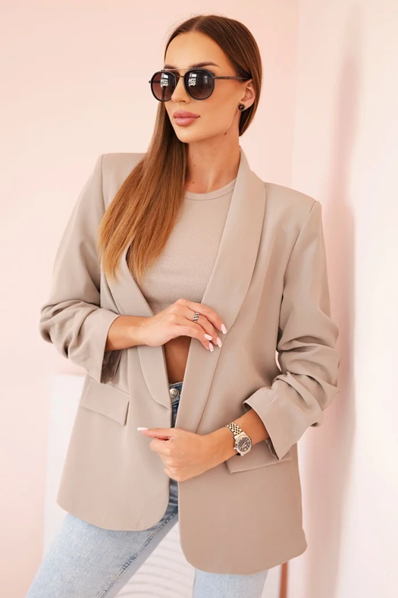 Elegantná bunda s chlopňami tmavo béžová