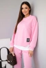 Women's set with a loose sweatshirt and joggers light pink