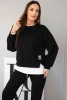 Damen-Set mit einem lockeren Sweatshirt und Jogginghosen schwarz