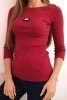 Women's ribbed blouse with 3/4 sleeves and decorative patch maroon