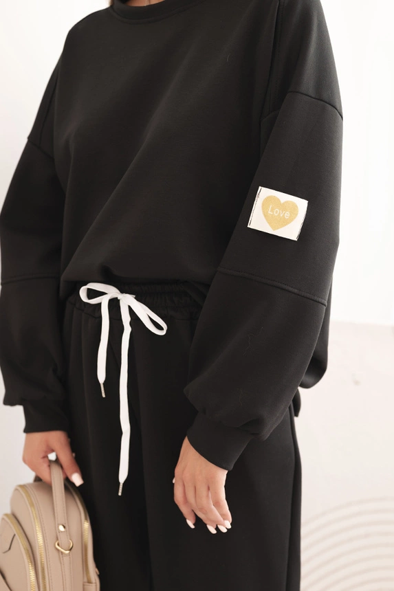 Damen-Set aus weichem Material mit lockerer Bluse und Hose mit dem Schriftzug LOVE schwarz