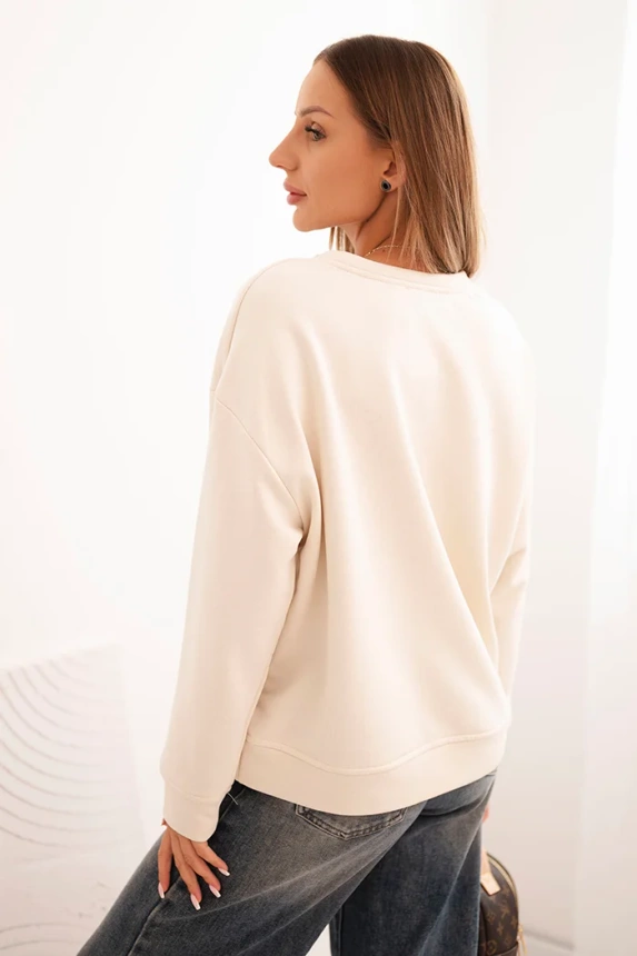 Damenpullover aus Baumwolle mit Katzenmotiv und Schriftzug hellbeige