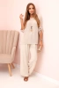 Damen-Set mit einer Bluse mit Halskette und einer weiten Hose beige