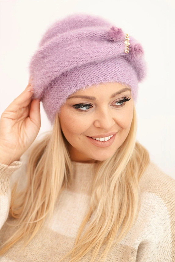 Women's winter fluffy hat with decoration and fur purple