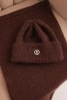Women's set with a hat and a neck warmer made of soft knitted fabric brown