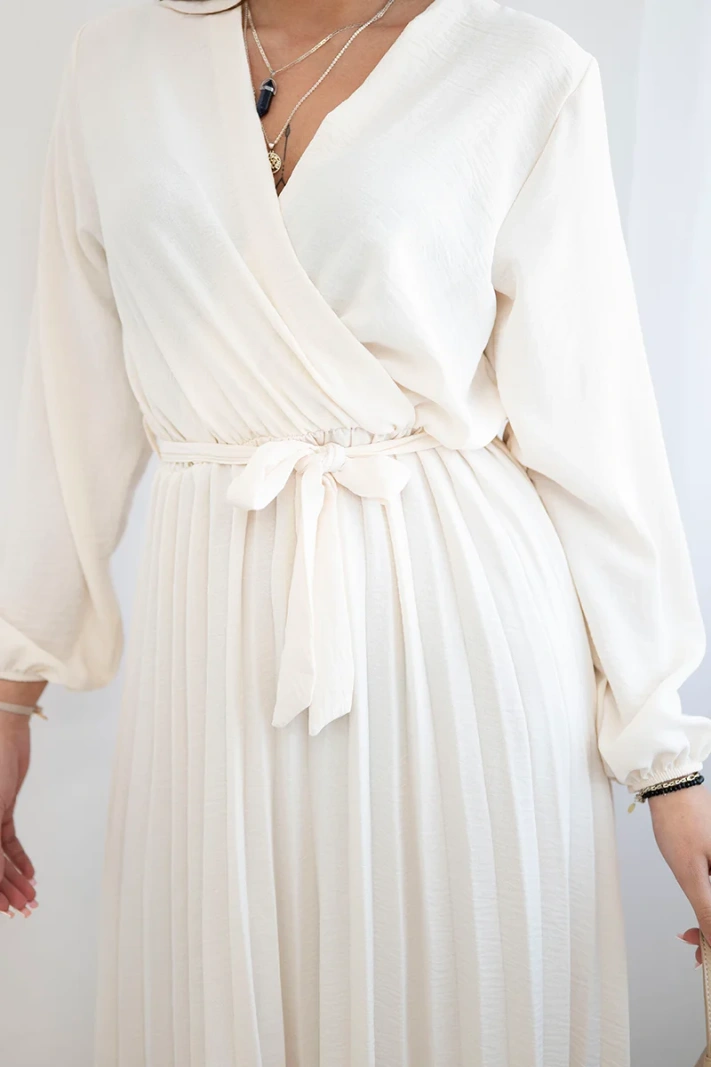 Dress tied with a pleated hem light beige