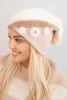Elegant women's cap with fur decorations and glittery strap ecru