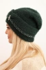 Women's winter fluffy hat with pearls and decorative braid dark green
