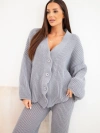 A women's knitted set with a cardigan and wide trousers gray