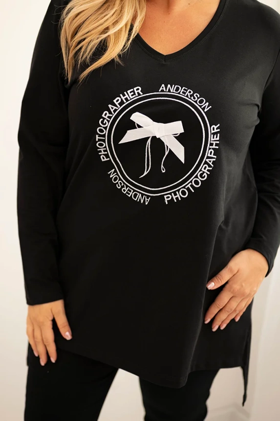 Damenbluse mit längerem Rücken und Druck schwarz