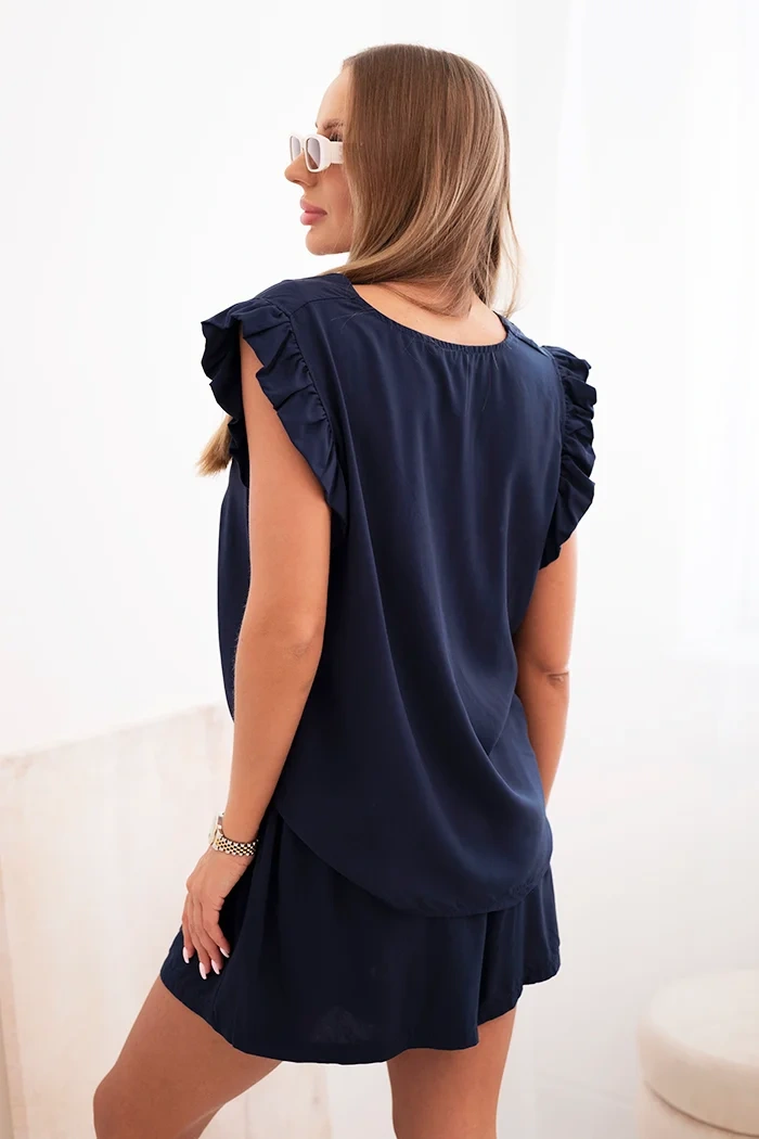 Damenanzug aus Viskose, Bluse mit Rüschen und kurze Shorts blau