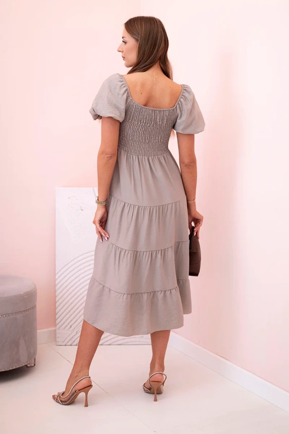 Women's viscose dress with puffed sleeves and a ruffled top fango