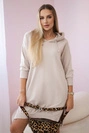 Dress with a hood and longer back beige