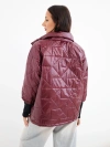 Women's quilted jacket with a short cut and stand-up collar light beige
