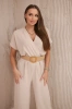 Overalls with a decorative belt at the waist beige