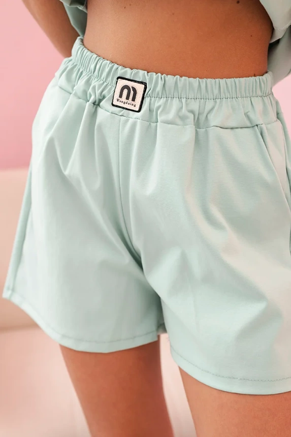 Women's set with a frill – a short-sleeved blouse and shorts with an elastic band dark mint