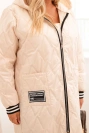 Plus Size women's quilted jacket with a hood and sporty cuffs beige
