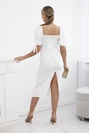 Dress ruffled at the back with tied sleeves ecru