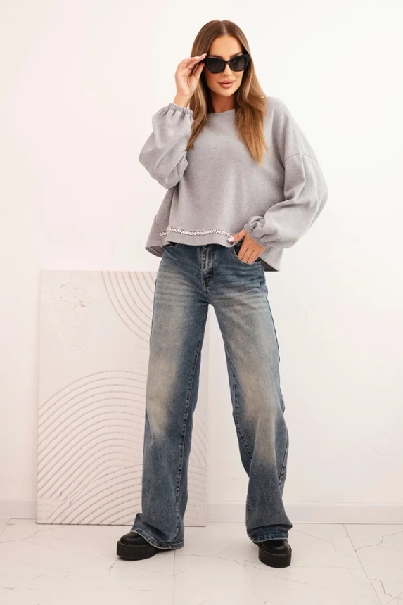 Women's sweatshirt with decorative finish at the bottom gray