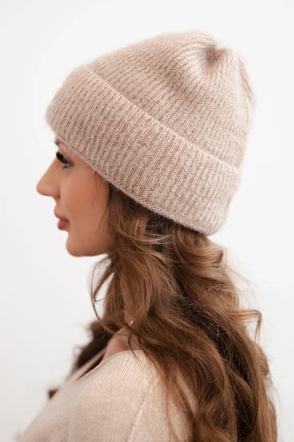 Women's winter fluffy hat with a decorative button fango