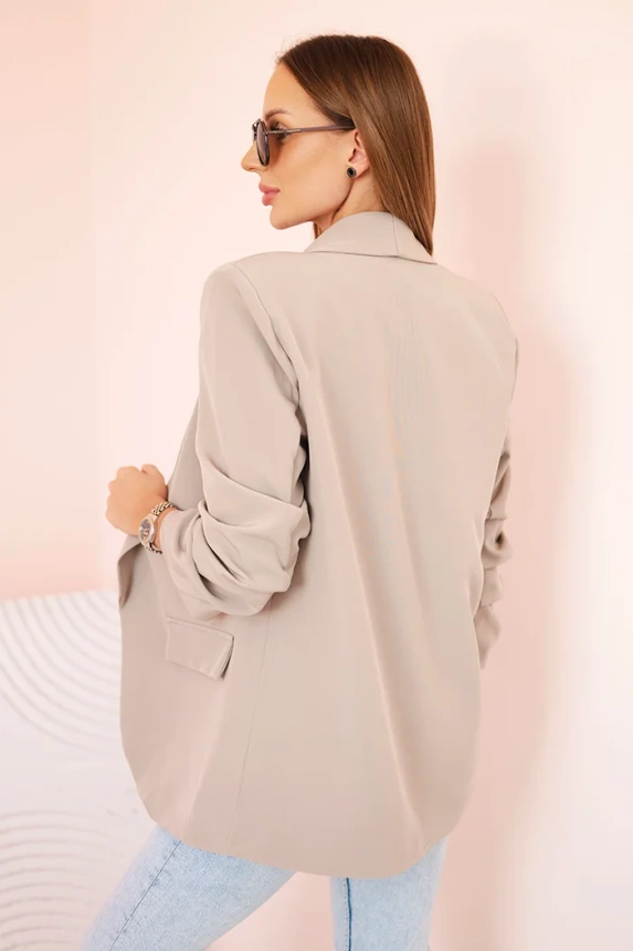 Elegantná bunda s chlopňami tmavo béžová