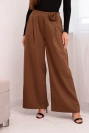 Elegant women's trousers with wide legs and a decorative flower light brown