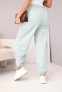 Women's high-waisted cotton pants with decorative button dark mint
