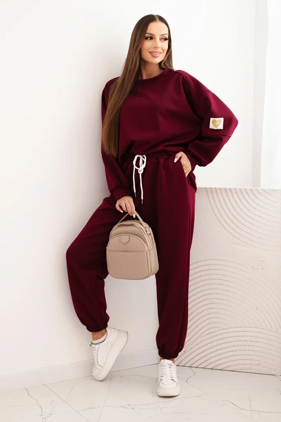 Ladies' butter set with a loose sweatshirt and pants with the inscription LOVE khaki