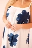 Women's dress with straps, ruffle, and floral print denim