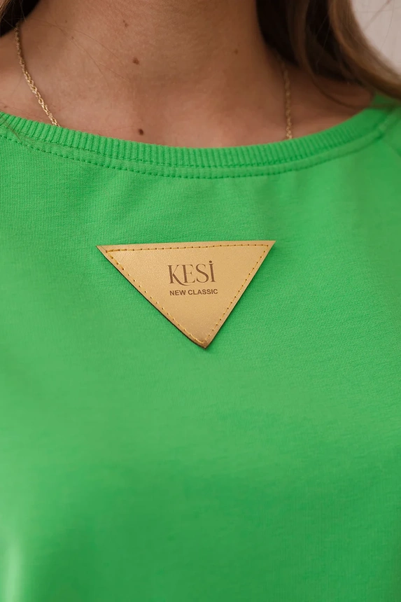 Cotton blouse with frills on the shoulders bright green