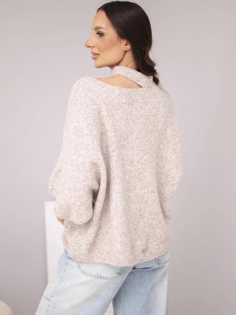 A sweater women's oversize with asymmetric neckline and turtleneck beige melange