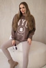 Baumwollset isoliertes sweatshirt + leggings braun