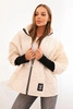 Women's quilted jacket with a short cut and stand-up collar light beige