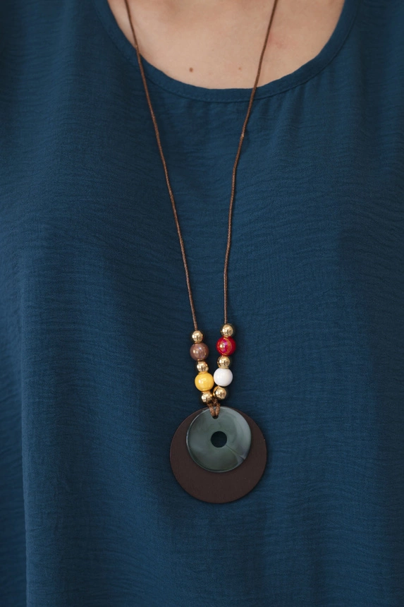 Oversized blouse with pendant nautical