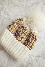 Cap with a pompom Ellen K325 ecru