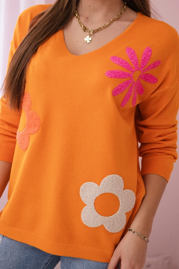 Sweater blouse with a floral pattern orange