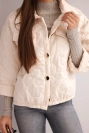 Spring women's quilted jacket with a floral pattern beige