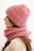 Women's set hat and winter fluffy snood with decorative emblem dark pink