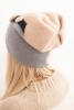 Elegant women's hat with fur decorations and glittery band beige