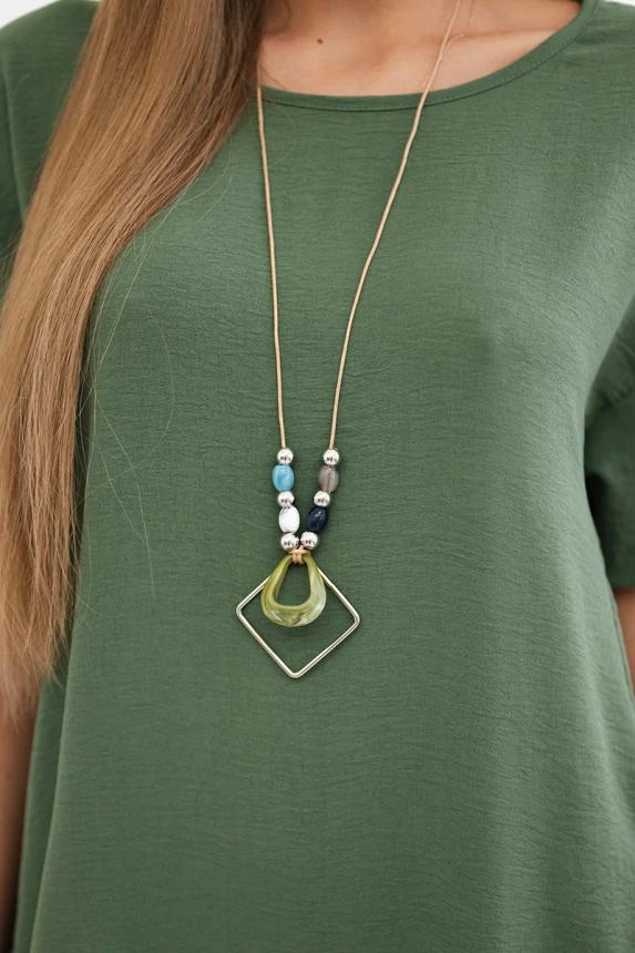 Dress with pockets and pendant light khaki