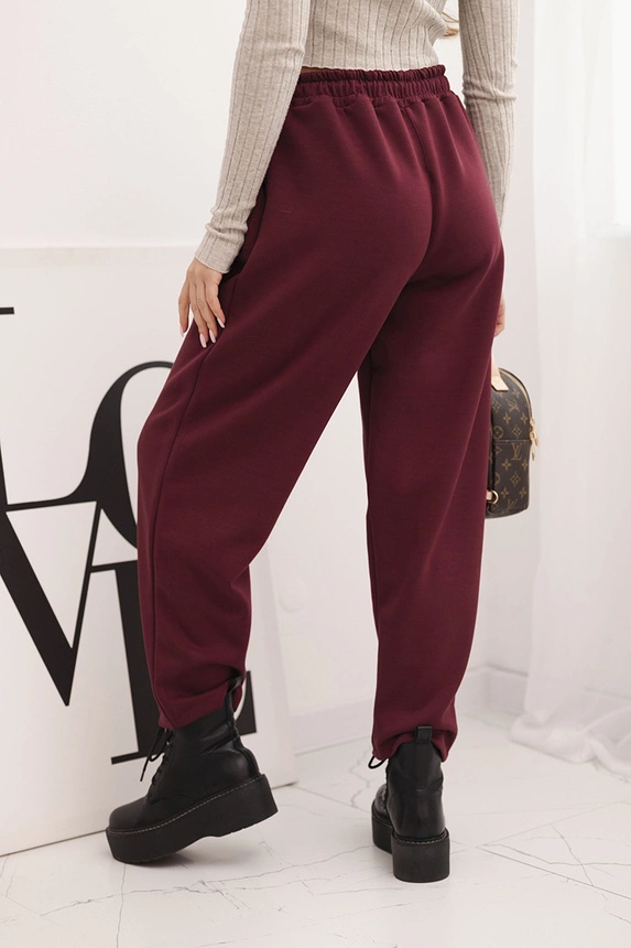 Elegant women's high-waisted trousers with a tie at the waist burgundy