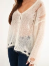Women's sweater made of 70% kid mohair with buttons with a worn effect ecru