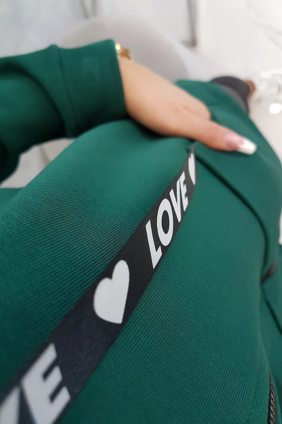 Mikina s dlhším chrbtom a kapucňou zelená