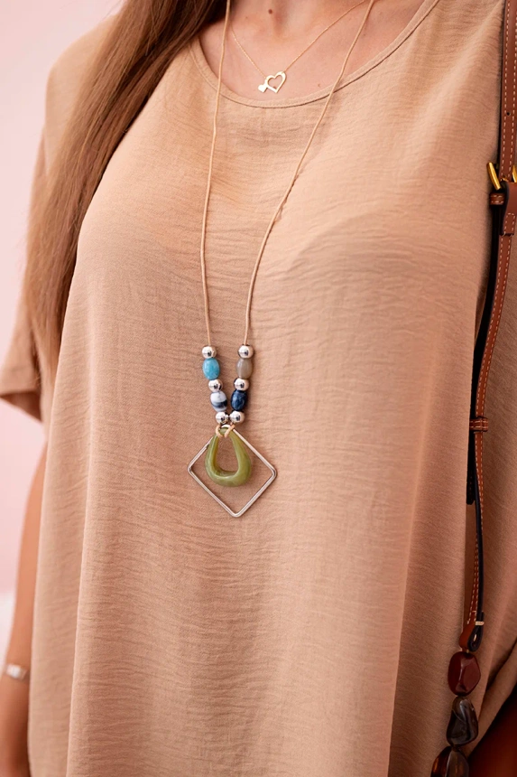 Oversized blouse with pendant light camel