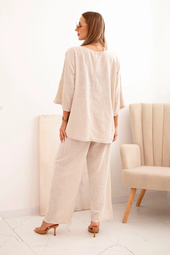 Women's set made of viscose blouse with necklace and trousers beige
